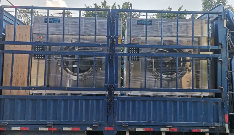 
		客户采购的2台100公斤洗衣机装车发货
		(图5)