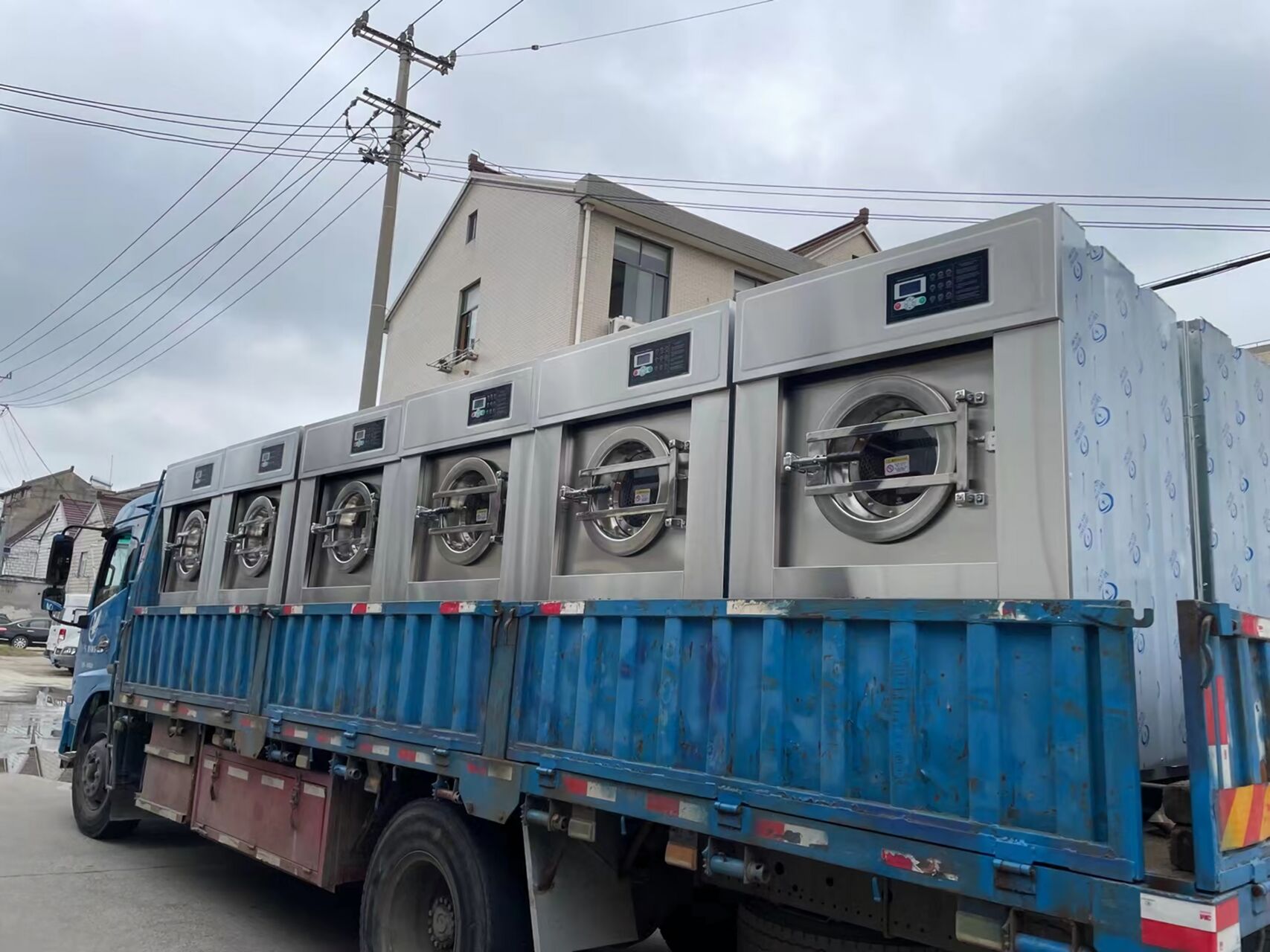 降低洗涤成本，从一台靠谱的工业洗衣机起头